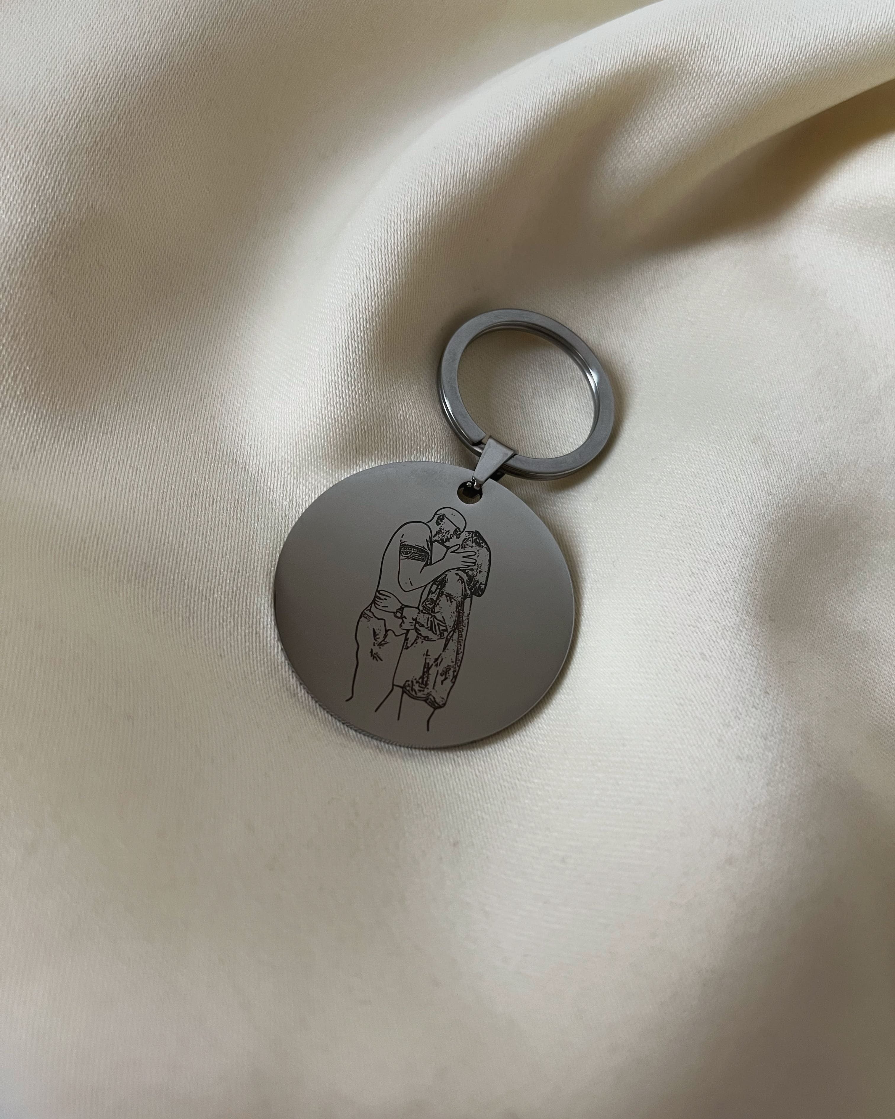 Porta-chaves redondo em aço inoxidável com gravação personalizada